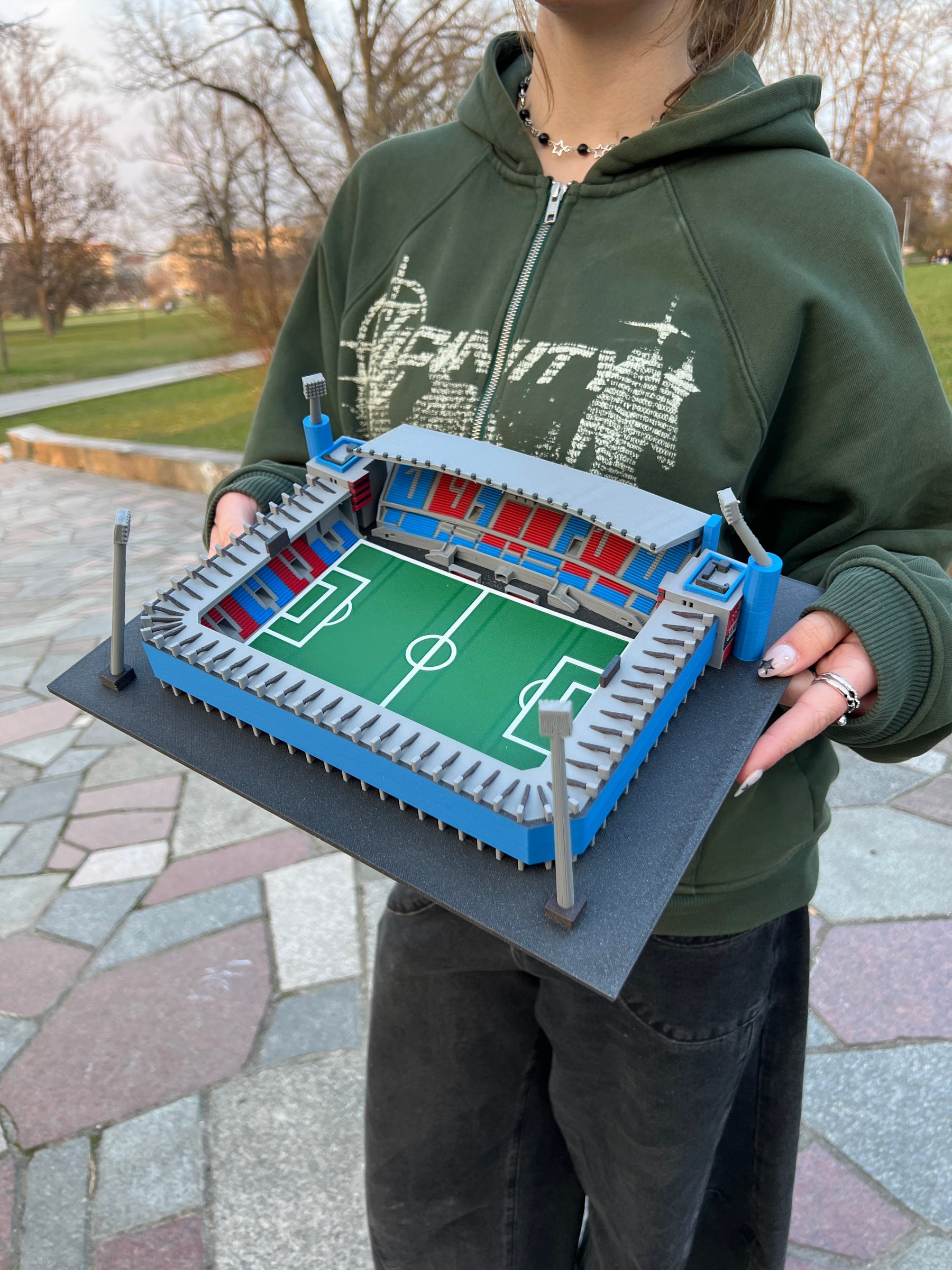 Close-up original photograph of a coloured XL stadium model